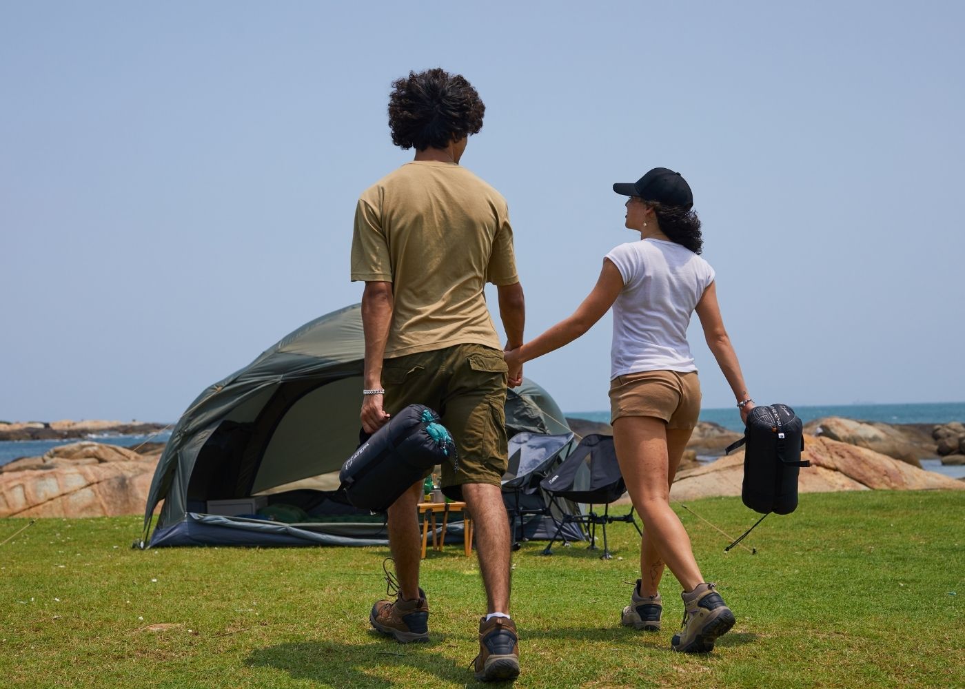 Step-by-step compression and storage of black Unitymarts down sleeping bag