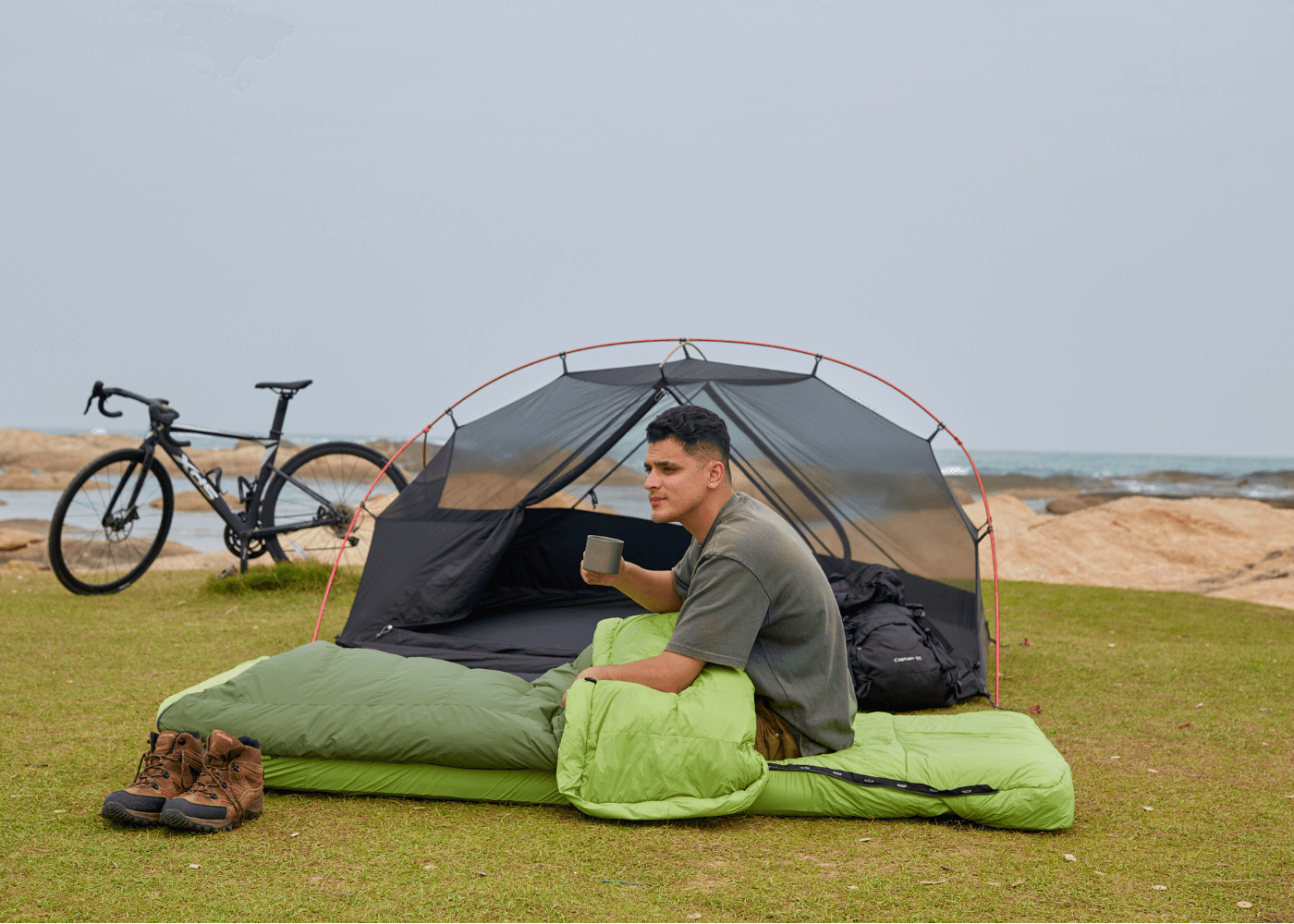 3-in-1 backpacking sleeping bag used as blanket, liner, or full mummy bag