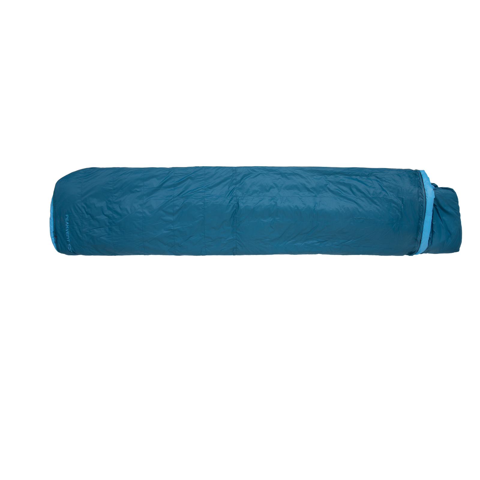 Blue sleeping bag packed compactly into compression sack for backpacking