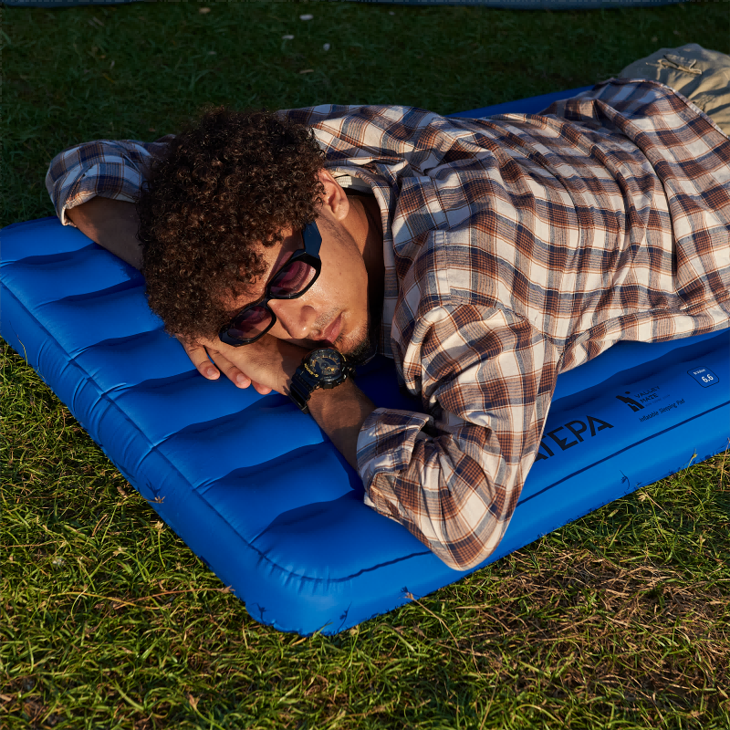 R value sleeping pad providing warmth and comfort during outdoor camping trips